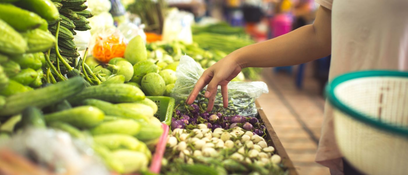 woman shopping organic veggies and fruits