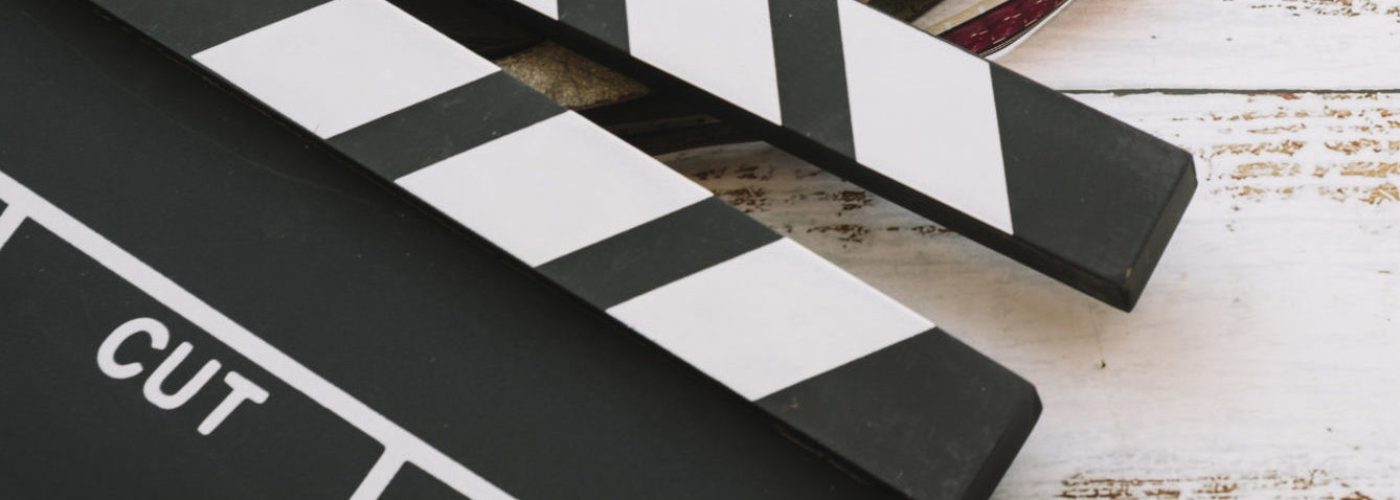 cinema-reel-with-clapperboard